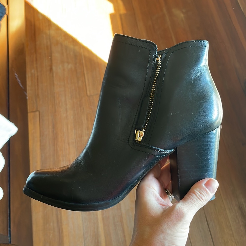 Aldo black high heeled boots with gold zipper